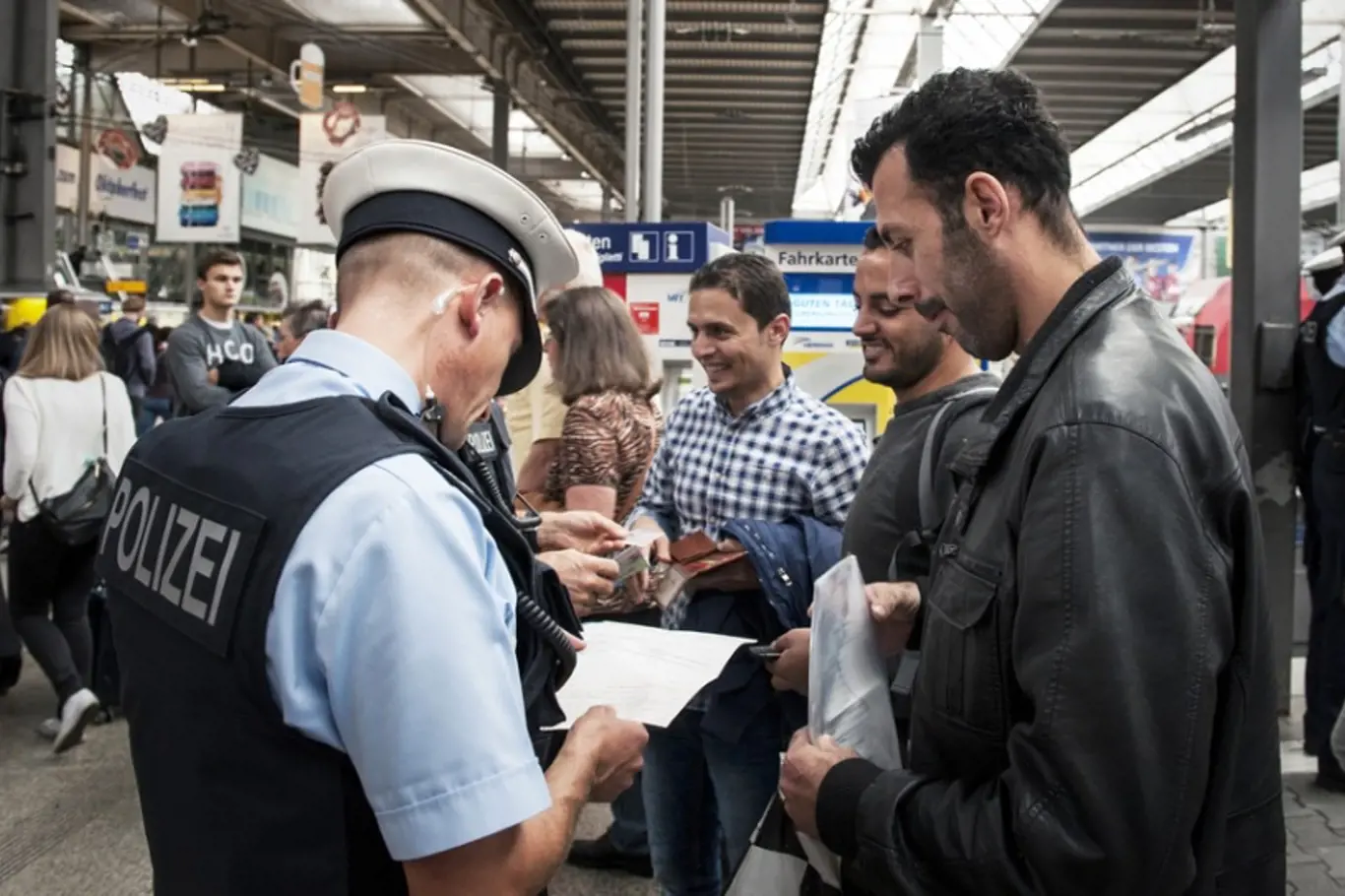 Uprchlíci na nádraží v Mnichově. Srpen 2015. 