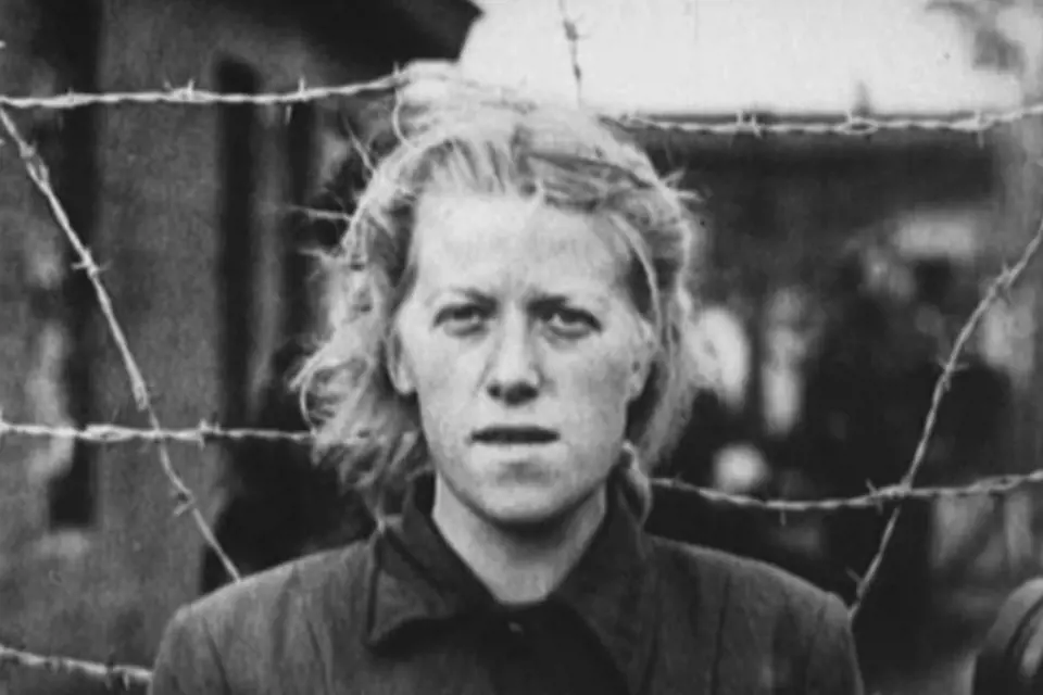 Herta Bothe, dozorkyně z Bergen-Belsenu. Fotografie pořízena spojeneckými vojsky 23. dubna 1945.